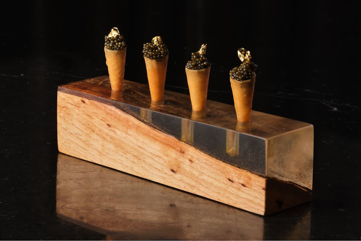 four cones of food 