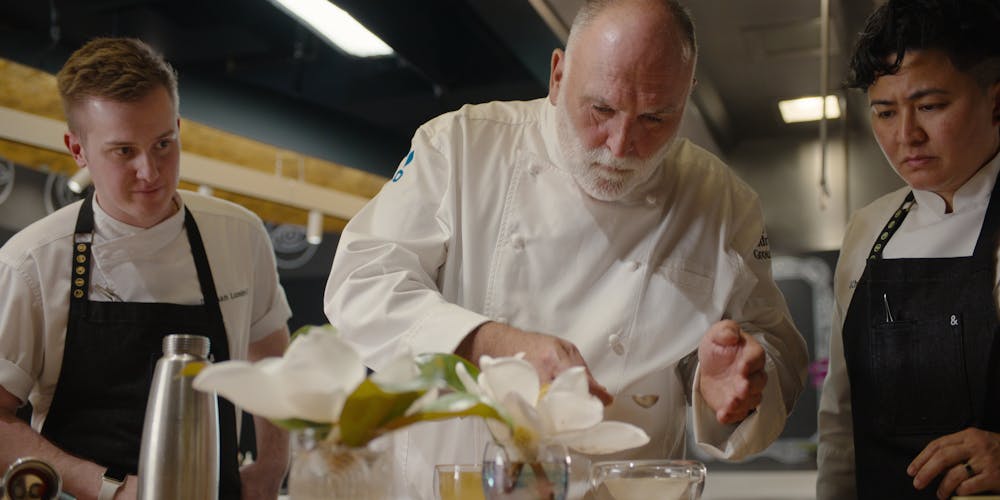 a close up of chefs in a restaurant kitchen